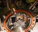 Assembling of vacuum components in vacuum chamber